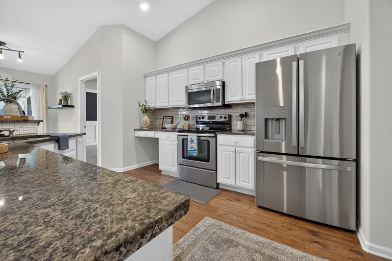 Kitchen with granite counters and stainless appliances